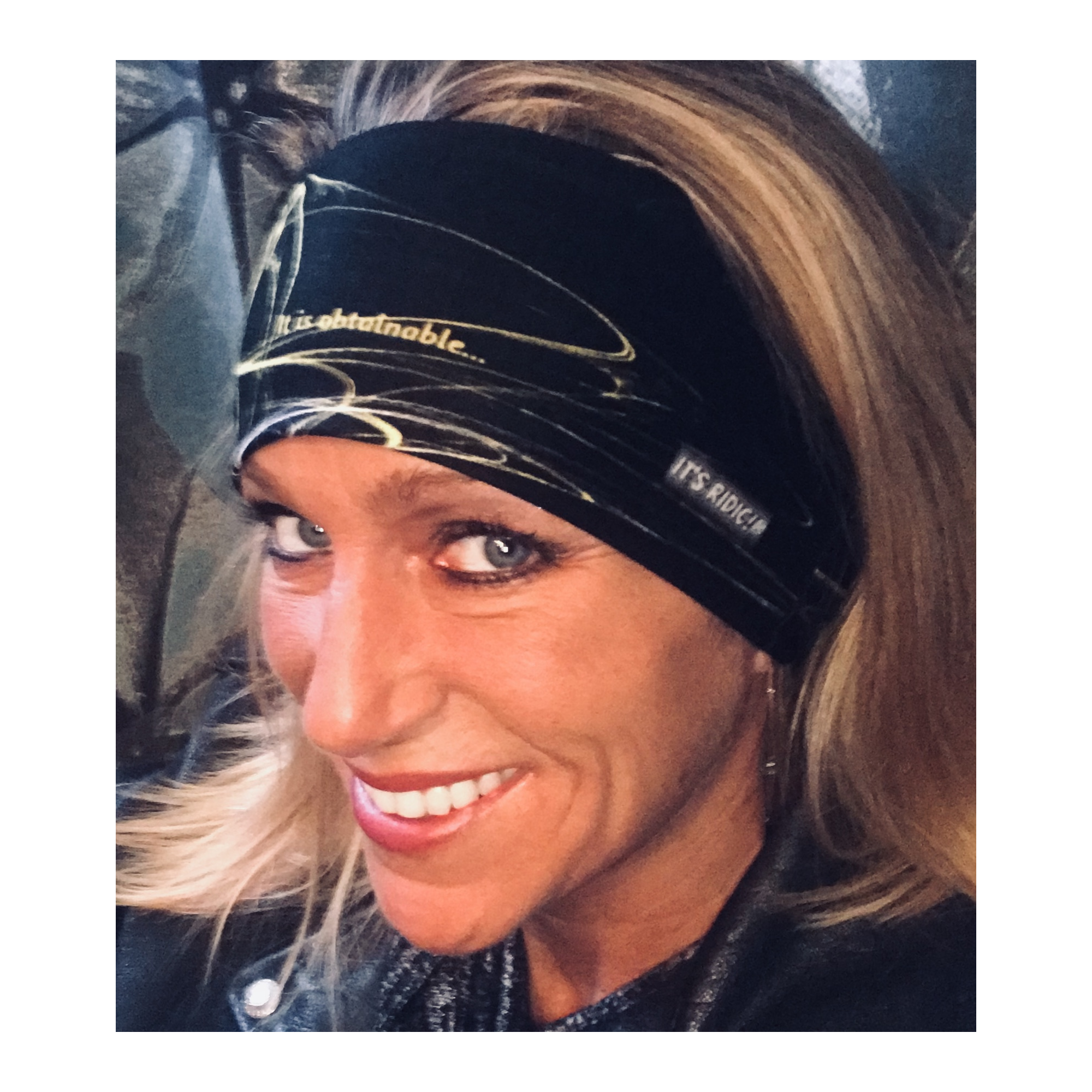 Black & yellow headband / bandana showing text "It is obtainable”.